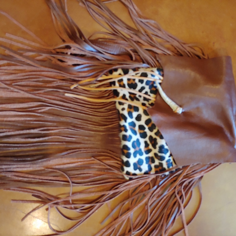 Leopard fringe backpack